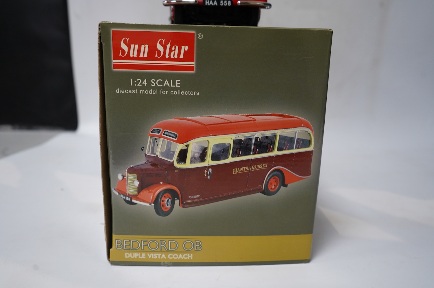 A boxed SunStar 1:24 scale Bedford OB Duple Vista coach, in Hants and Sussex delivery, with separate wing mirror and certificate. Condition - good, the model appears not to have been out on display.